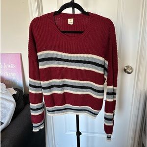 Red and blue striped sweater